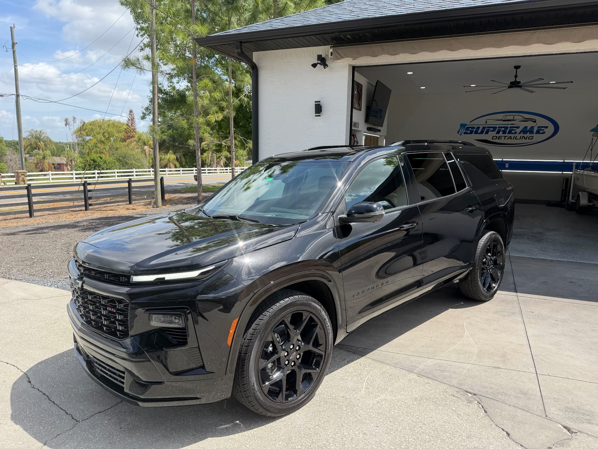 Black Chevrolet Traverse RS finished at the Supreme Detailing shop in Clermont, FL